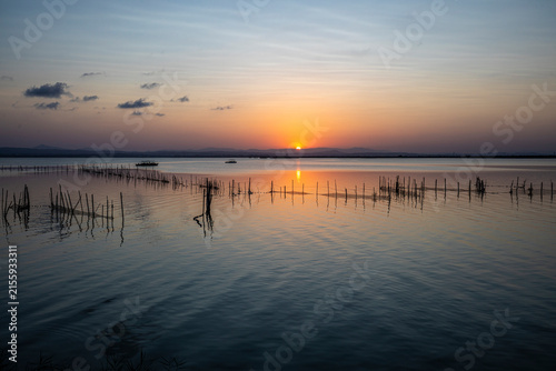 A beautiful sunset over La Albufera Natural Park in Valencia, Spain