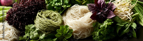 Fresh vegetables and noodles arranged beautifully for a healthy meal preparation.