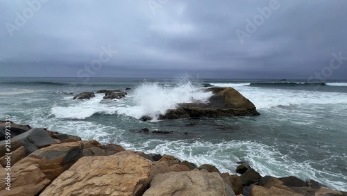 Ocean waves and rocks on the coast of California