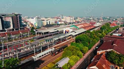 Yogyakarta railway station and tracks surrounded by dense urban buildings
