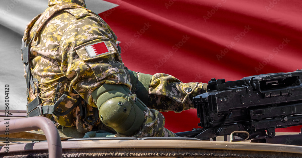 Obraz premium Bahrain flag with soldier at machinegun turret