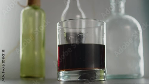 Putting glass with soda on table. Original sound. 24fps. Prores 422HQ