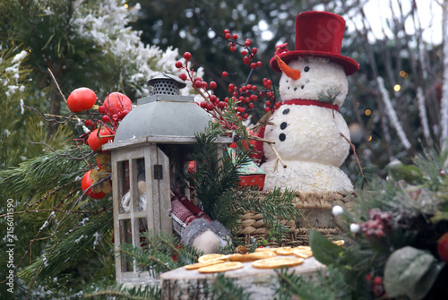 Принти на полотні New Year's snowman with red berries and a lantern