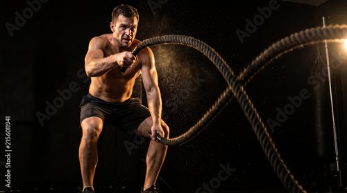 Man Doing Battle Rope Workout