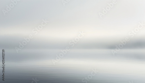 Serene abstract waterscape featuring a misty horizon, gentle ripples, and soft neutral tones.