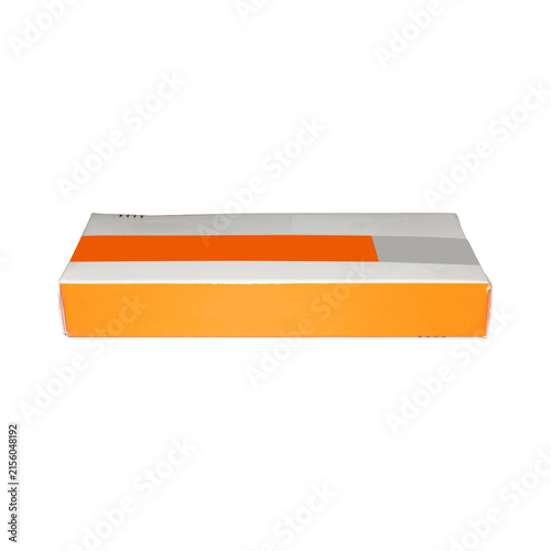 Flat cardboard box with orange and grey stripes during studio lighting for retail packaging
