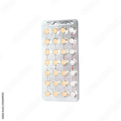 Oral contraceptive pills in blister pack with selective focus during studio lighting