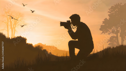 Photographer taking pictures at sunset with flying birds