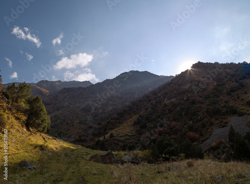 Mountain Landscape Illuminated by Sun Rays at Sunset