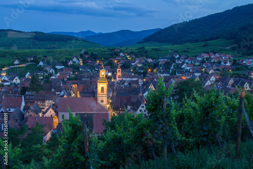 Blue Hour Summer Panorama of Riquewihr Village and Vineyards in Alsace, France