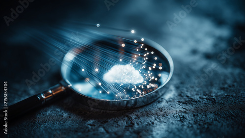 A magnifying glass focused on a cloud with streaming data represents cloud computing analysis and digital information management.
