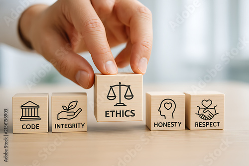 Wooden blocks with ethics concepts and symbols close up photograph