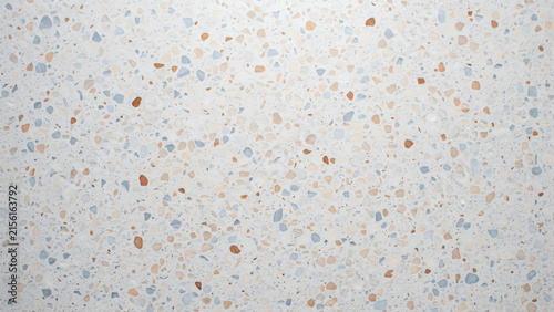 Terrazzo tile surface texture background in pastel tones with white, blue and brown chips for modern interior design