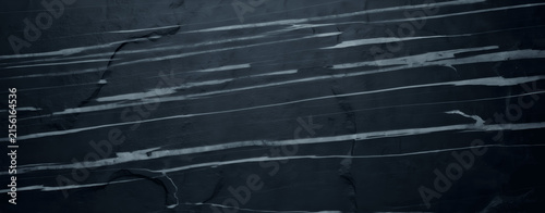 Dark slate stone texture background with natural white streaks and stripes for design and decoration