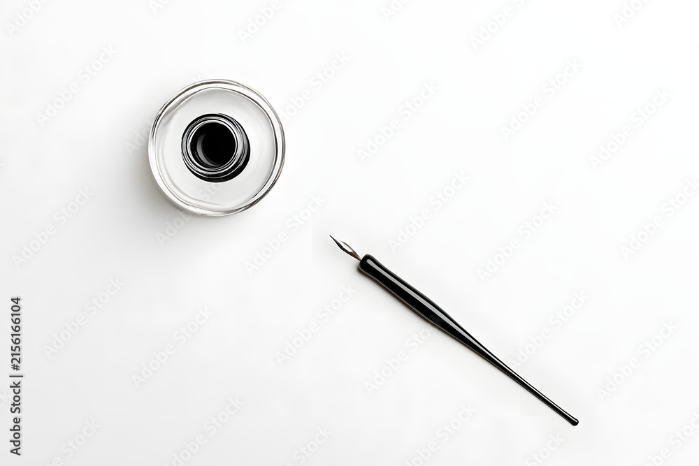 Fototapeta premium A overhead photo of an ink well and an ink pen, shot from above on a white background with copy space