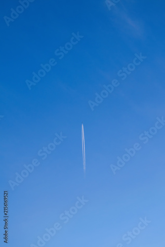 Contrail Stretches Across Clear Sky