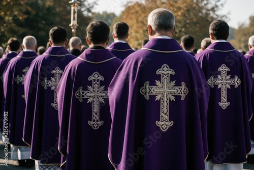 Clergy in purple robes with crosses walk in procession outdoors. Religious men wear ornate garments for Christian ceremony. Faith and devotion shown during outdoor worship event.