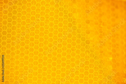 Yellow and Amber Reflective Safety Tape Patterns Close-Up
