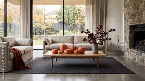 Modern Living Room with Autumn Decor and Stone Fireplace