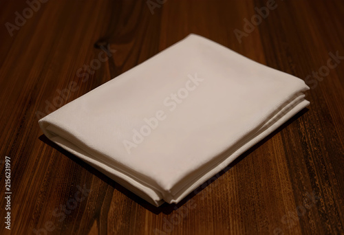 Clean white folded linen na...