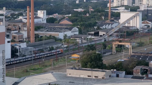 A train passing between old factories and warehouses in the Lapa neighborhood of Sao Paulo.