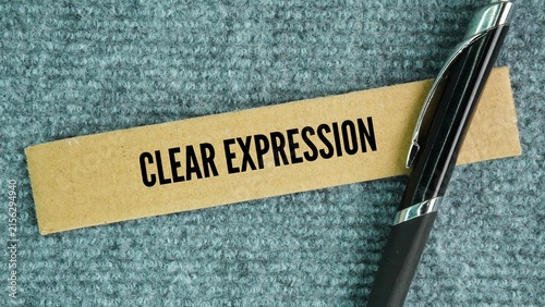 фотографія Pen and paper box with the word clear expression