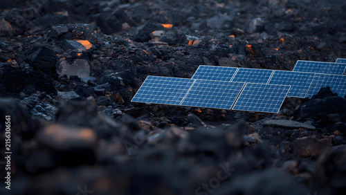 Modern solar panels installed in rugged, rocky terrain, generating clean energy amidst natural landscape.