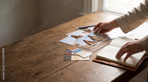 Professional Artist Reviewing Photo Prints and Color Palettes