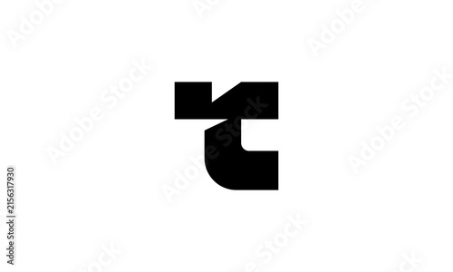 Abstract Geometric T Letter Logo Design with Bold Modern Shape