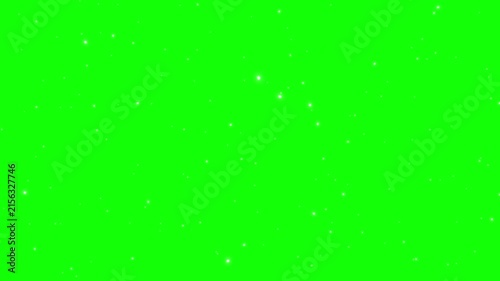 White sparkling particles float on a bright green background.