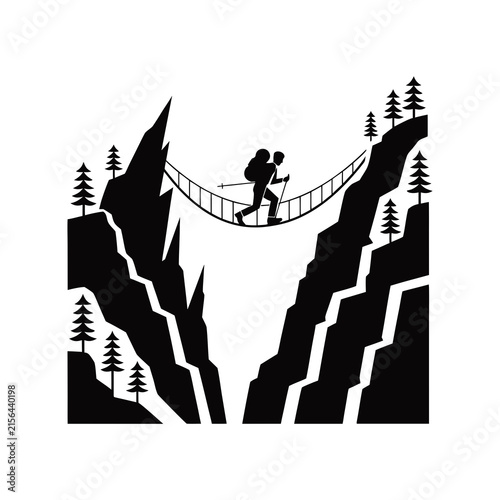 Hiker crossing a rope bridge between mountain cliffs, vector adventure icon design.