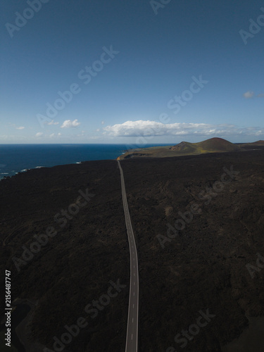 Aerial Coastal Road Through Lava Fields Near Montana Bermeja