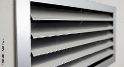 air vents or jalousie grilles with a neatly arranged horizontal blade design for air circulation.