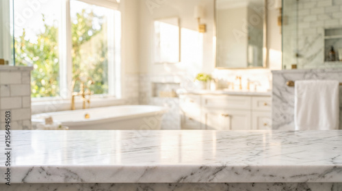 Empty marble stone bathroom countertop mockup template standing directly before luxurious residential master bath interior featuring large white soaking tub near window