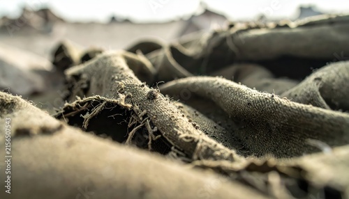 Close-up Macro View of Rough Burlap Fabric Texture with Frayed Edges and Visible Weave Detail