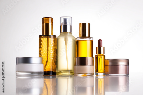 Professional Collection of Assorted Cosmetic Bottles and Jars Isolated on White Background