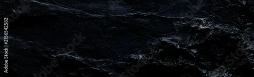 Panel kuchenny z motywem A high-resolution dark stone texture for use in patterns and backgrounds