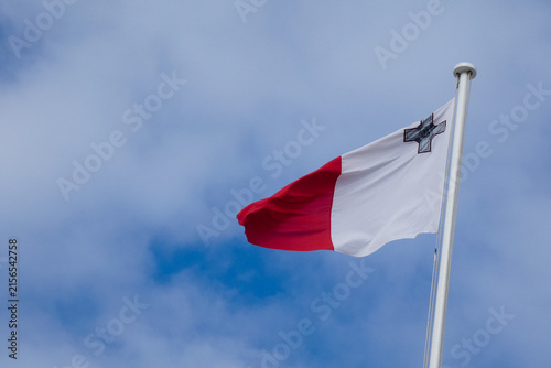 Obraz na plátně Maltese flag waving in the wind on a sunny day