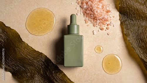Matte sage green dropper bottle, coarse pink salt, kelp, oil drops