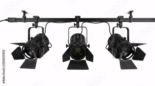 Three black professional studio track lights mounted on a ceiling rail against a white background.