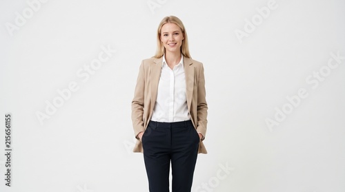 Successful blonde businesswoman in blazer on white background