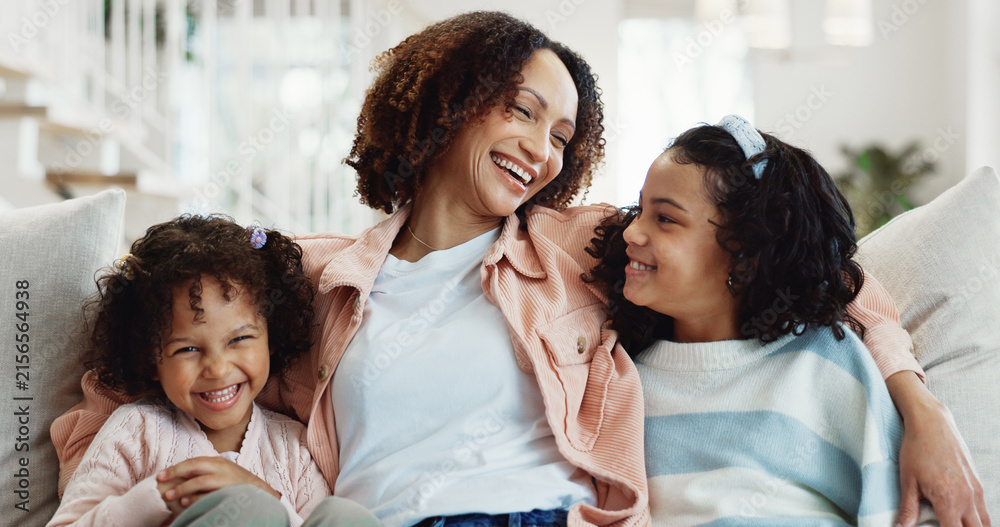 Obraz premium Mother, relax and laugh in home with children, love and funny joke for bonding together on weekend. Portrait, happy woman and girl kids in living room with humor, support or care for family wellness.