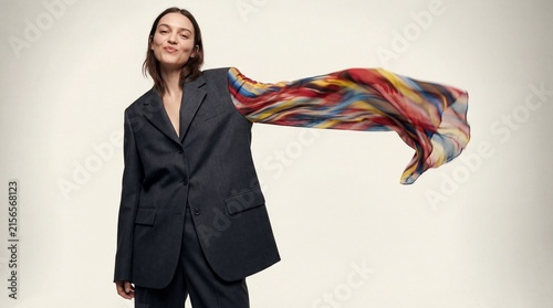 Fashion Fusion: Bold Suit Meets Colorful Scarf