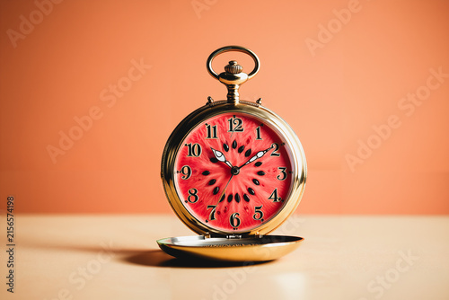 Photography Pocket Watch Face Replaced by a Tiny Watermelon Slice
