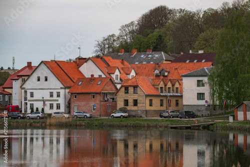 Canvastavla Traditional red tile roofs and wooden houses in the historic old town of Talsi, Latvia