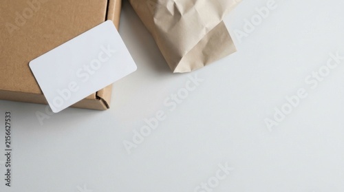 Blank White Business Card Mockup With Kraft Packaging and Tissue Paper
