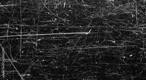 Distressed Scratched Film Texture Overlay with Heavy Grain and Dust Particles on Black Background