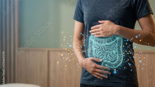 Gut microbiome probiotics digestive health concept with human holding stomach and glowing intestine illustration for gut health and wellness