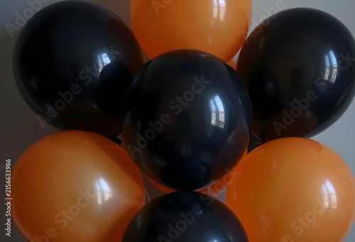 Black and orange balloons a...