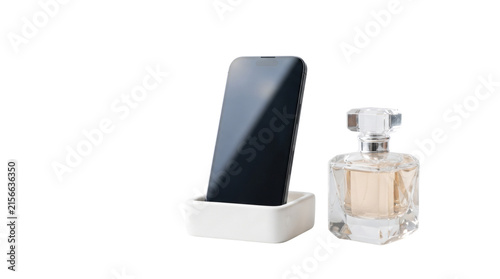 Minimalist smartphone on white charging dock, luxury glass perfume bottle, modern lifestyle tech and beauty accessories on white background